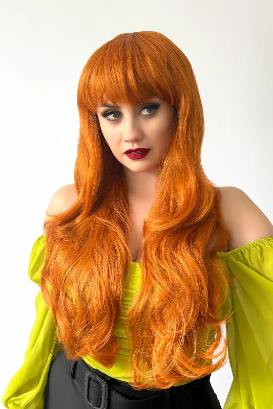 Colored wig with a side - swept bang for a sophisticated lookLong wavy ginger wig with vintage-style straight fringe: Coral