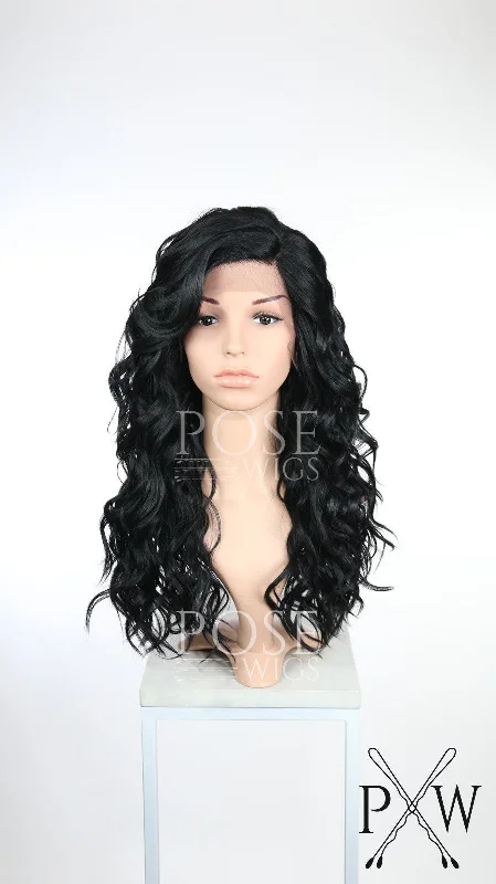 Lace wig with a wispy fringe for a soft and feminine lookCalyx Midnight Black - Natural Series