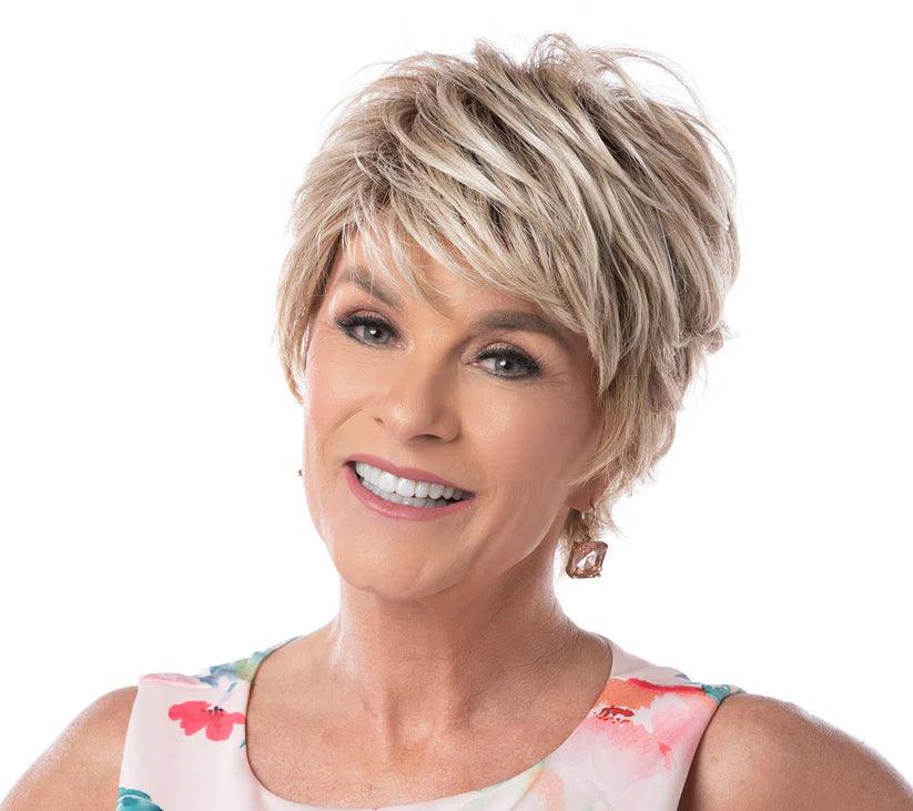 Bob wig with a curly fringe for a playful and youthful vibeAnytime Wig by Toni Brattin | Heat Friendly Synthetic (Basic Cap)