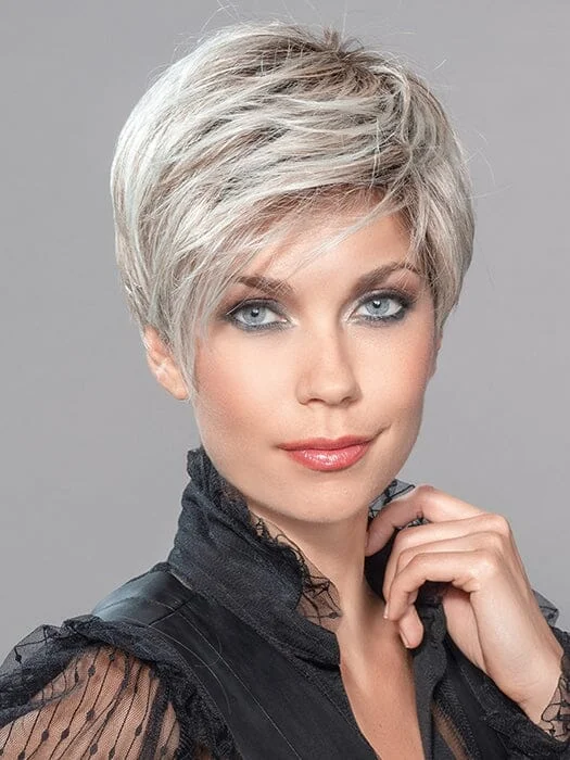 Bob wig with side - swept bangs for a sophisticated lookLink Heat Friendly Wig by Ellen Wille