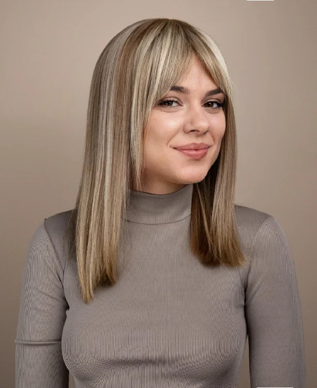 Human - hair lace wig for a luxurious and natural feellong bob with fringe human wig - 16" blonde highlights.