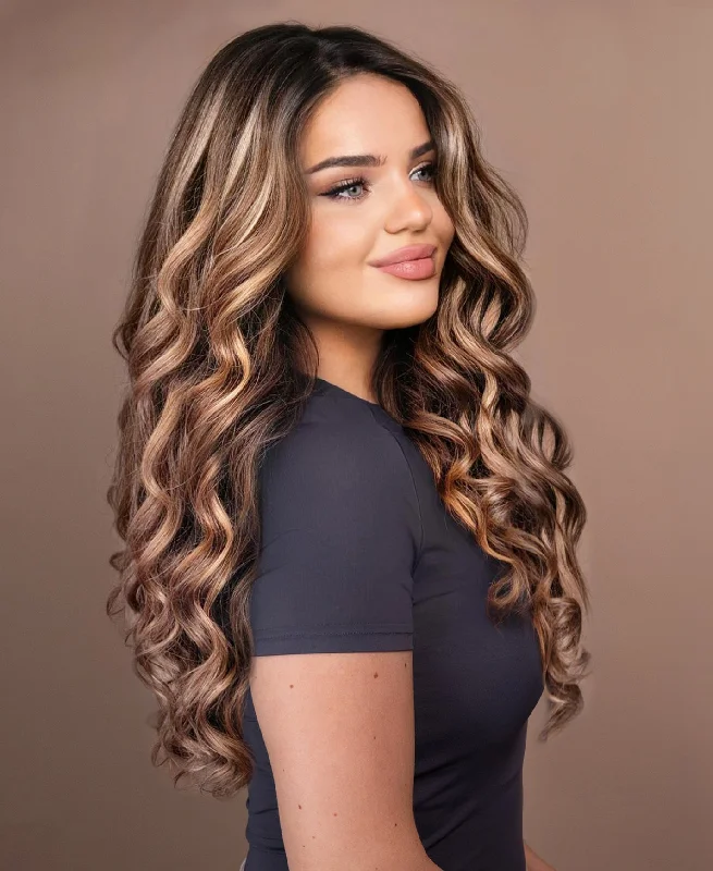 Lace wig with a natural - looking root for a more realistic lookput on & go pre-cut lace wavy human wig - 24" bronzed highlights.