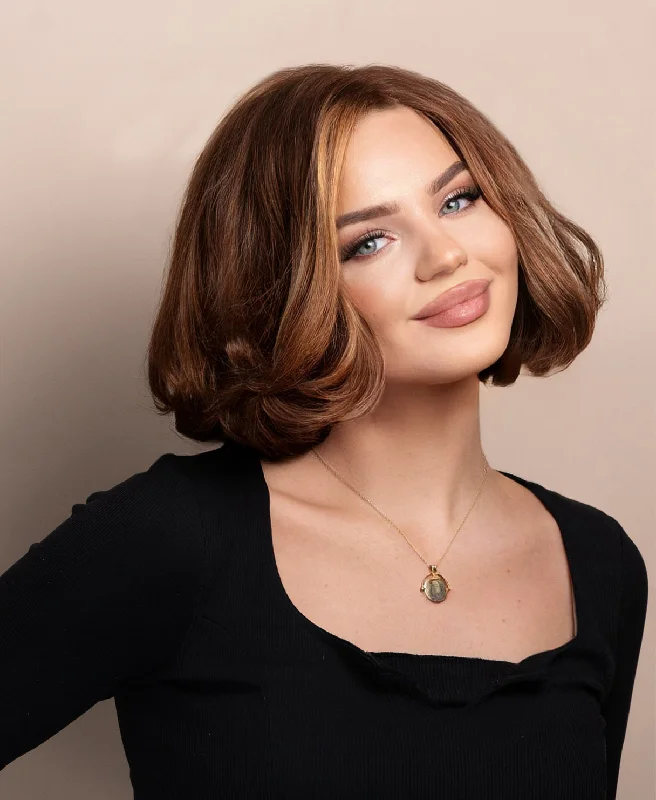 Lace wig with a wavy texture for a beachy lookwedge bob human wig - 8" caramel highlights.