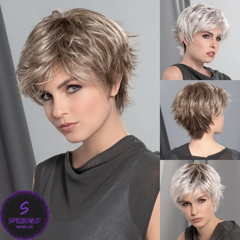 Long - length wig with a curly fringe for a playful and youthful vibeGilda Mono - Modixx Collection by Ellen Wille